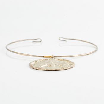 Lars Arby, three neck rings with pendants, silver, Gothenburg including 1977, 1978, and 1982.