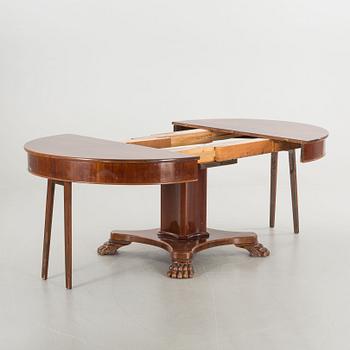 AN EMPIRE STYLE TABLE FROM AROUND 1900.