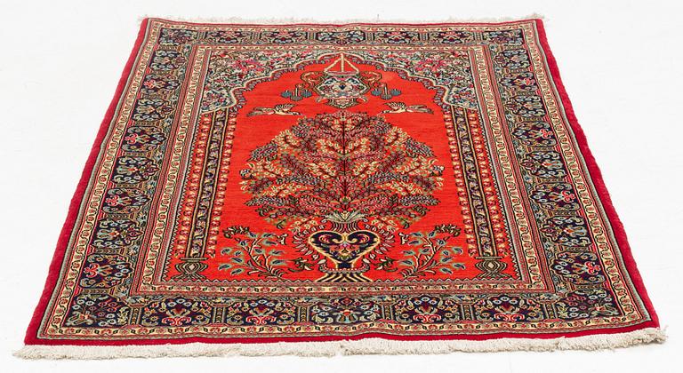 A Quum rug, ca 152 x 106 cm.