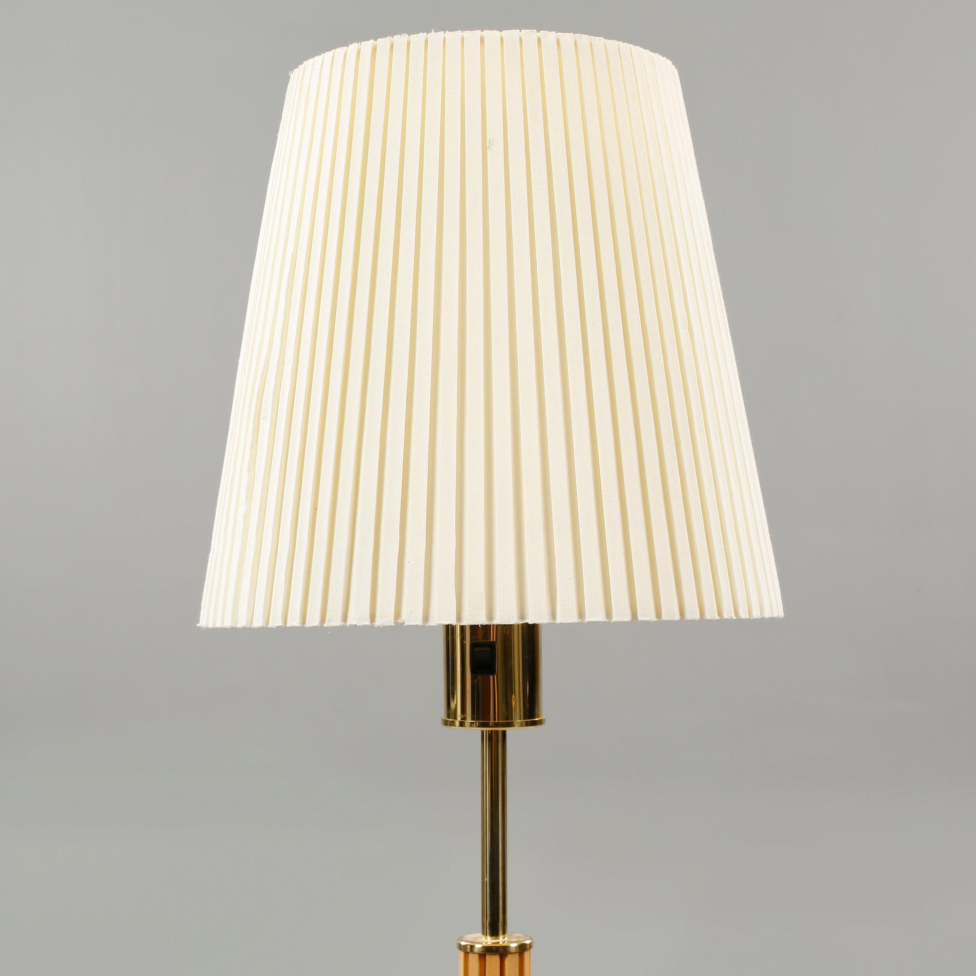 A floor lamp designed by Hans Arne Jakobsson made in Markaryd in the late 20th century.