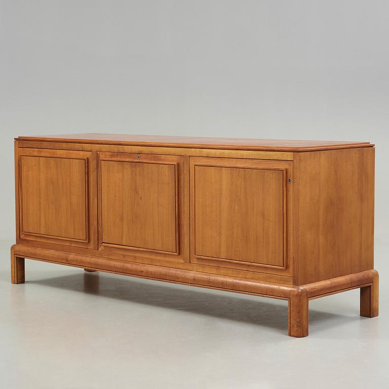 NILS AHRBOM & HELGE ZIMDAHL, a walnut sideboard, Stockholm 1932.