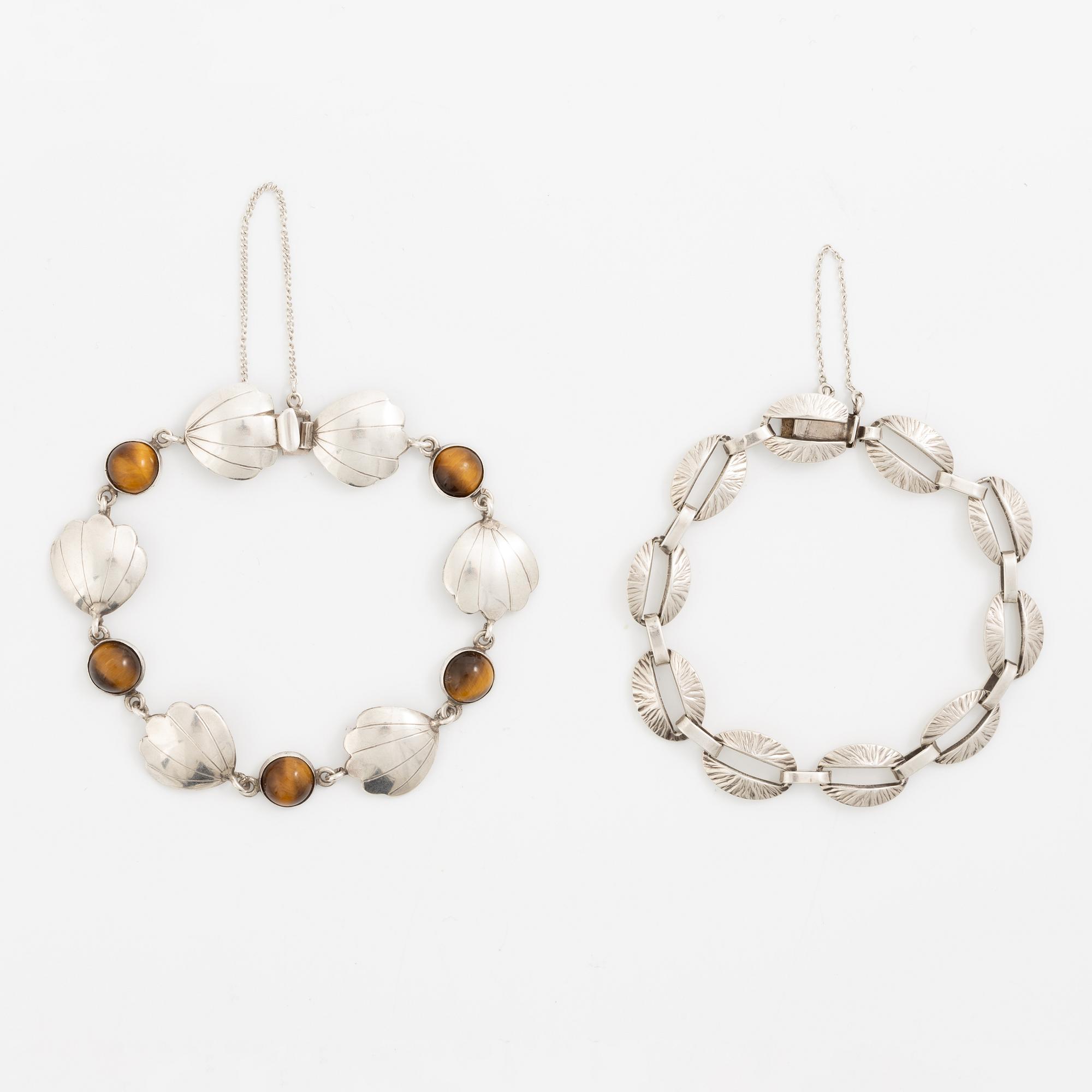 Victor Janson, two silver bracelets, one set with tiger's eye.
