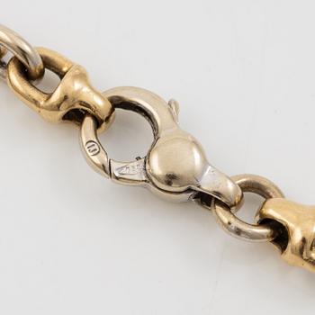 Bracelet 18K gold in various colour variations with round brilliant-cut diamonds.