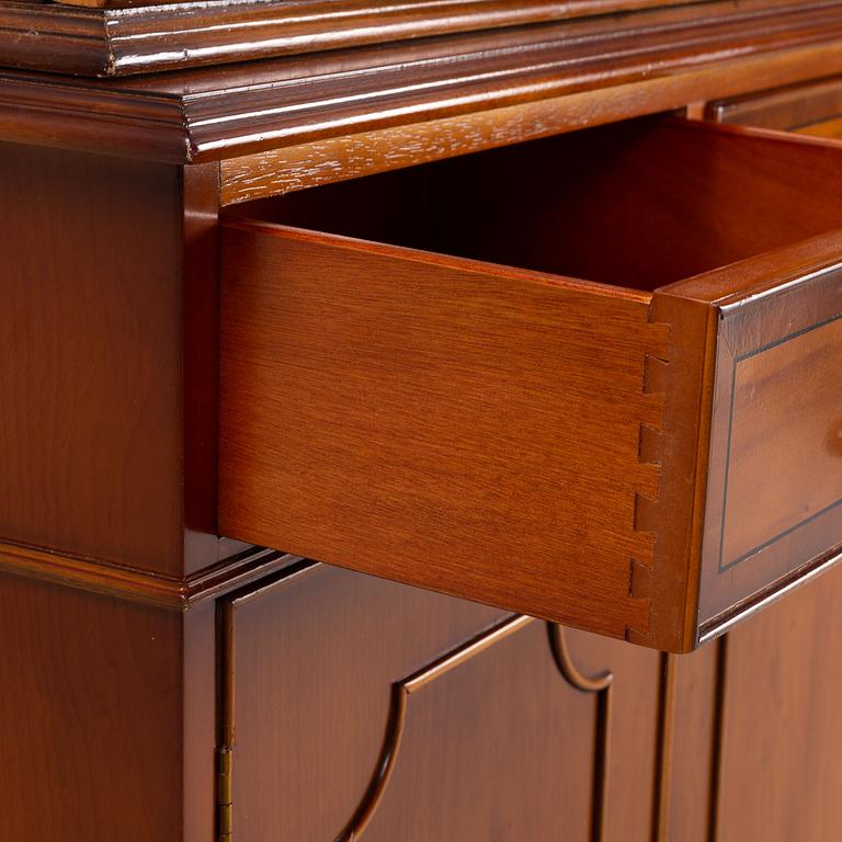 An English yew cabinet, 21st Century.