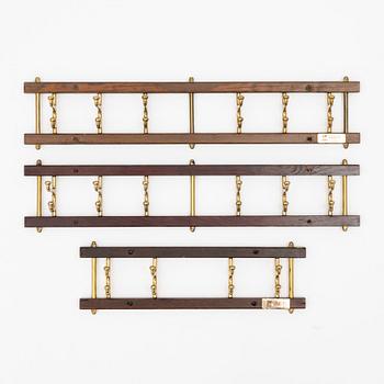 A set of three 'Dekorativ' coat hangers, Skoglunds metallgjuteri, Anderstorp, 1950's/60's.