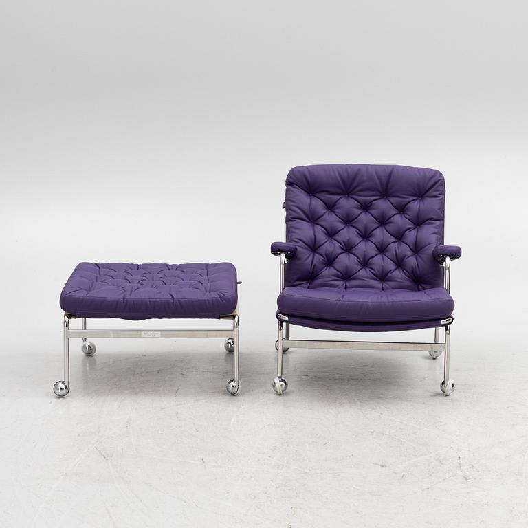 Bruno Mathsson, a limited edition of 'Karin 73' leather upholstered easy chair with footstool, from Dux, Released 2022.