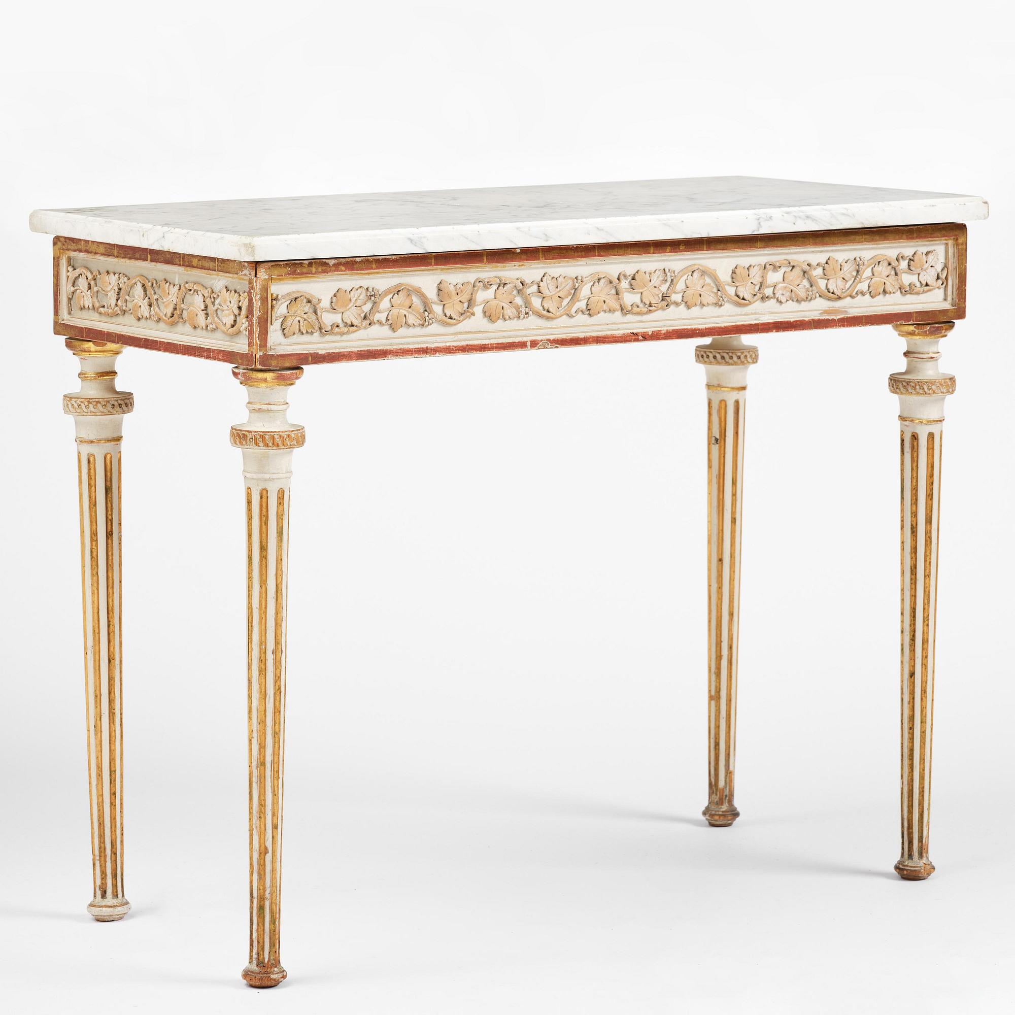 A late Gustavian carved giltwood and marble console table, attributed to P- Ljung (royal ornament carver 1788-1819).
