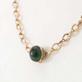 Necklace 18K gold with a cabochon-cut green tourmaline and rose-cut diamonds.