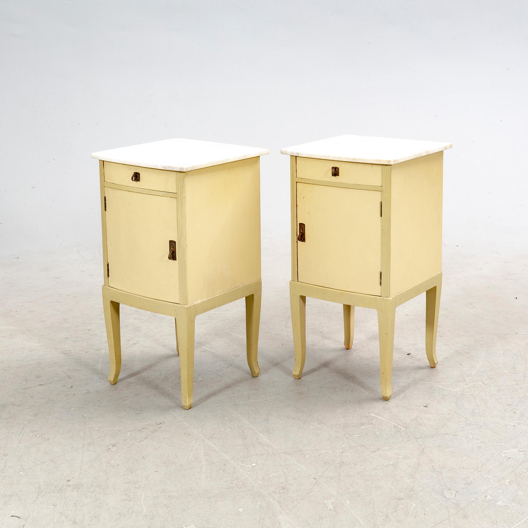 A pair of painted bedside tables first half of the 20th century.