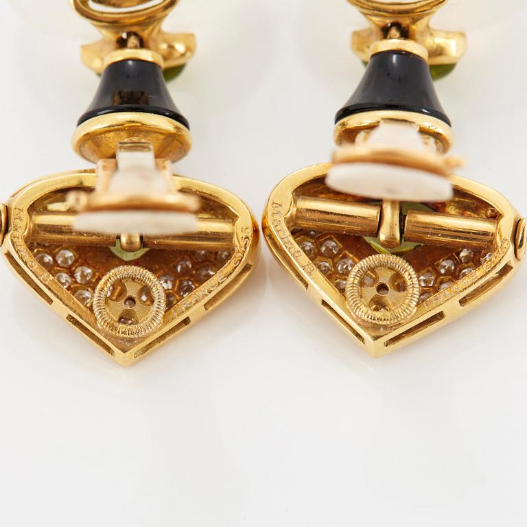 A pair of Marina B earrings.