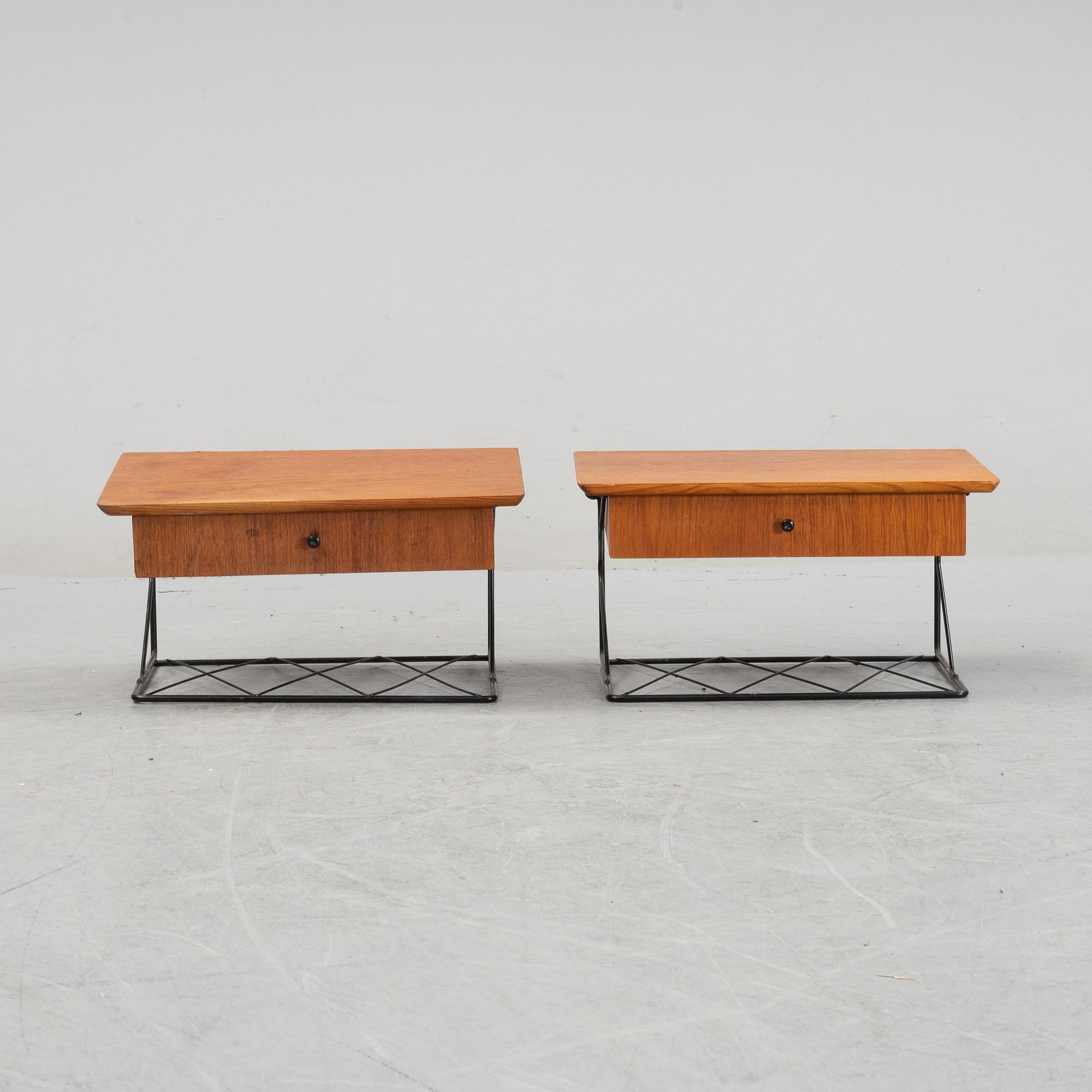 A pair of teak bedside tables, 1950's.