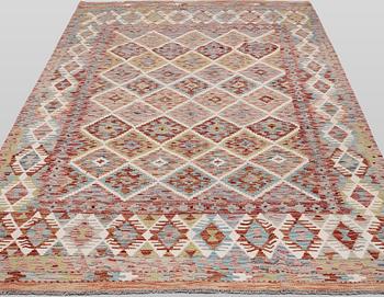 A Kelim carpet, 289 x 199 cm.