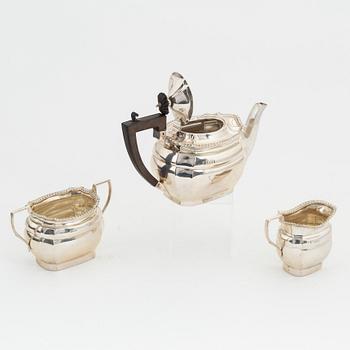 A three piece silver tea service, London 1918.