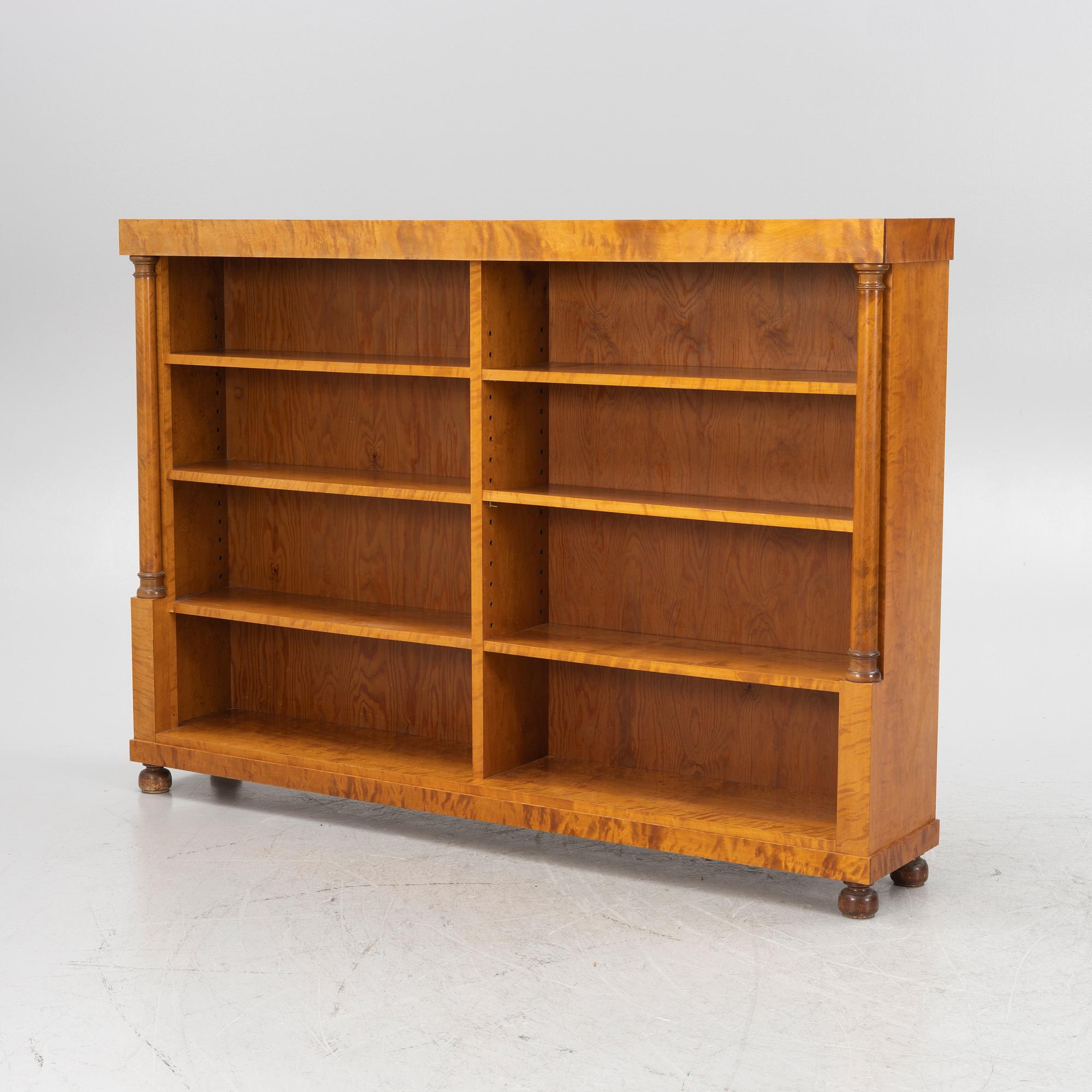 An Empire style bookcase, first half of the 20th century.