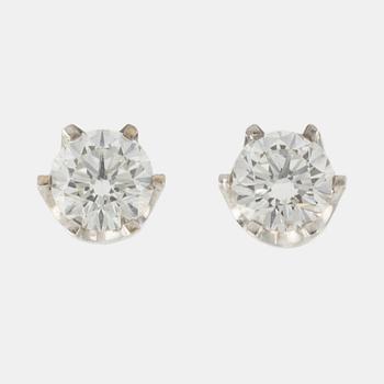 Brilliant cut diamond stud earrings.