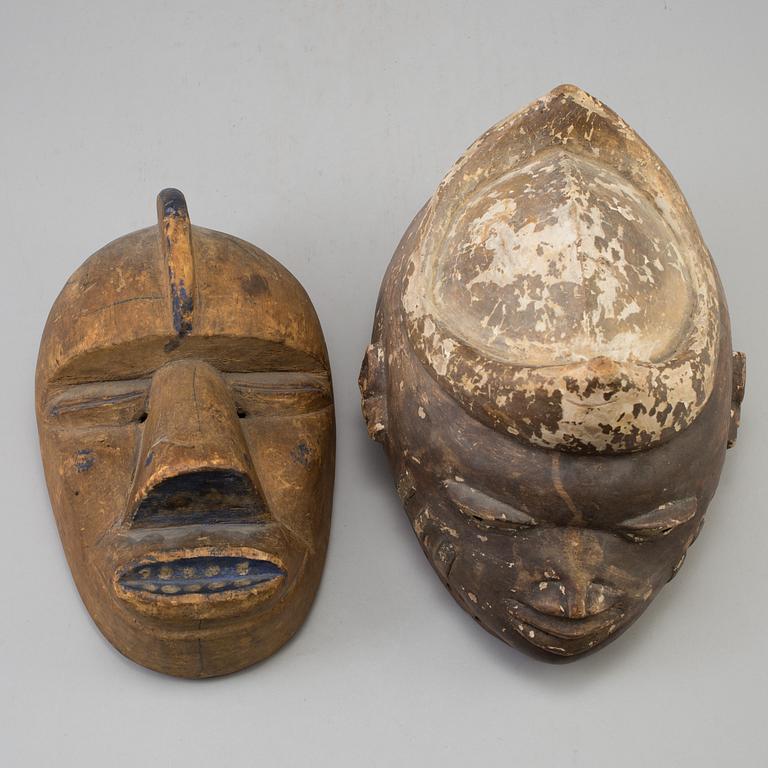 Two 20th century african wooden masks.