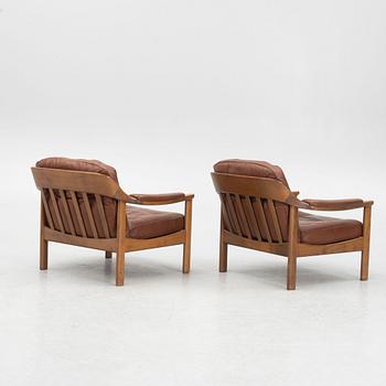 A pair of 1970's armchairs.