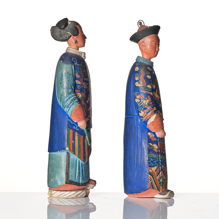A pair of Chinese Export polychrome painted nodding head figures, Qing dynasty, early 19th Century.