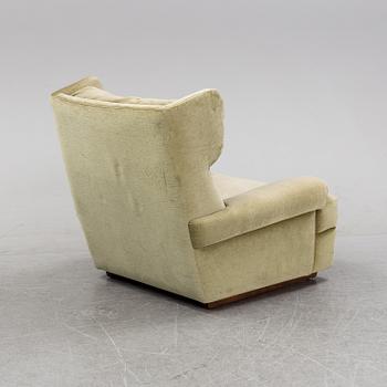 Åke Nilsson, a 'Master' armchair, Dux AB, launched 1969.