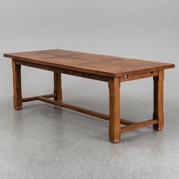 A mid 20th century oak dining table.