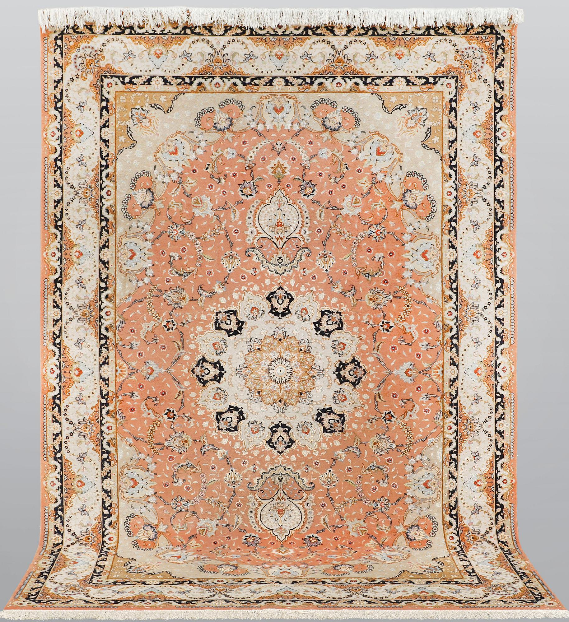 A part silk Tabriz carpet, so called 50 Raj, c 301 x 200 cm.