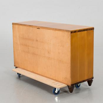 A "MODEL OK" SIDEBOARD DESIGNED BY AXEL EINAR HJORTH FOR NORDISKA KOMPANIET.