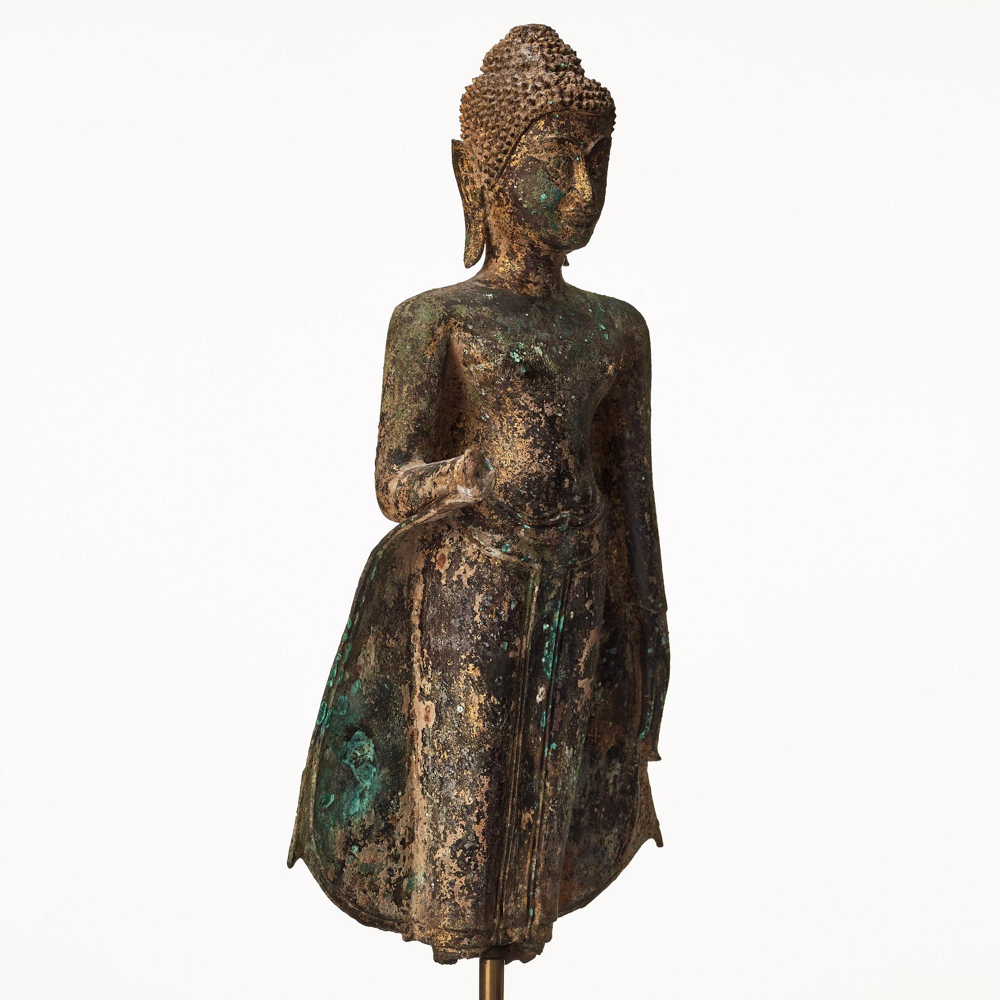 A standing figure of Buddha, Thailand, 18th Century.