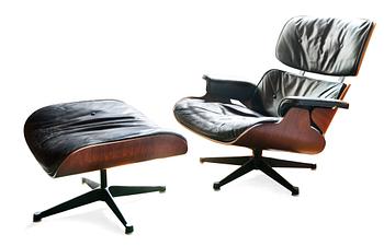 A LOUNGE CHAIR AND OTTOMAN.