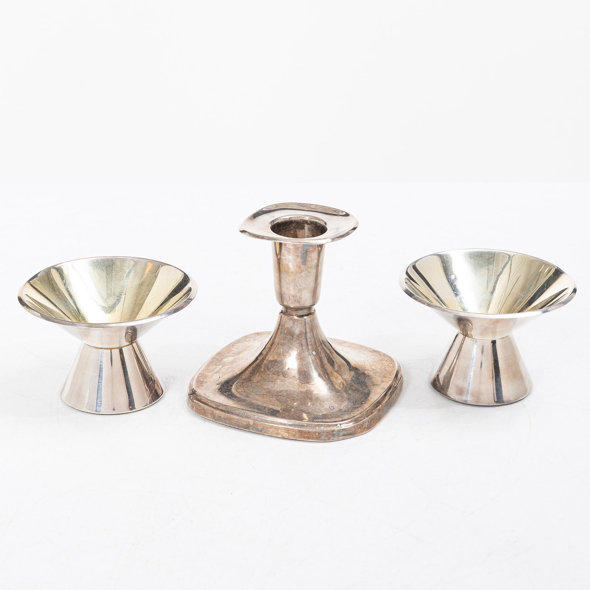 Three silver candelabra, GAB, Stockholm 1967, and Thore Eldh for Ceson, Gothenburg 1977.