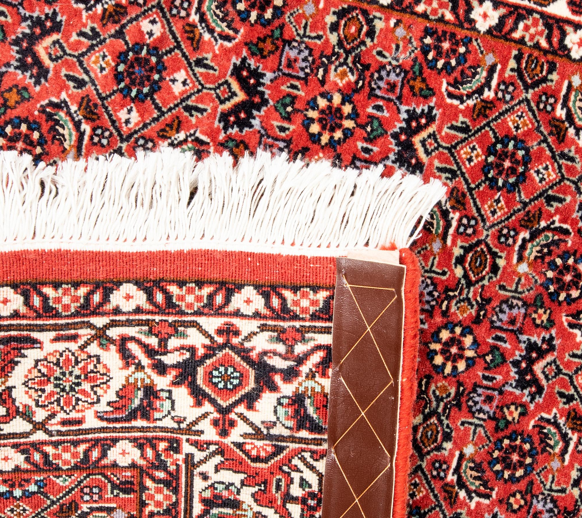An old Bidjar runner approx 306x87 cm.