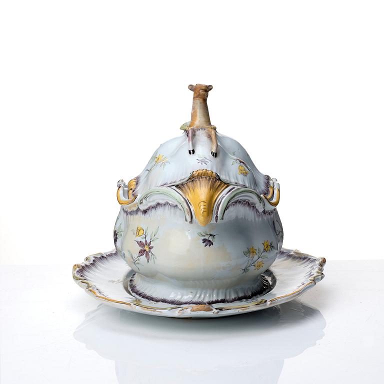 A Swedish Rörstrand faience tureen with cover and stand, 18th Century.