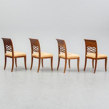 A set of four empire style mahogany chairs, first half of the 20th Century.