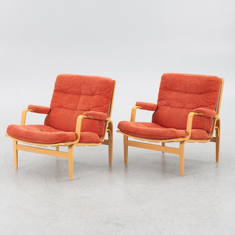 Bruno Mathsson, a pair of 'Ingrid' armchairs, Dux.