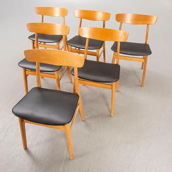A set of six Danish beech chairs later part of the 20th century.