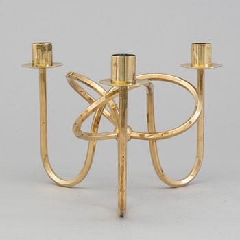 A brass candleholder "The knot of Friendship"design Josef Frank for Svenskt Tenn, Stockholm.