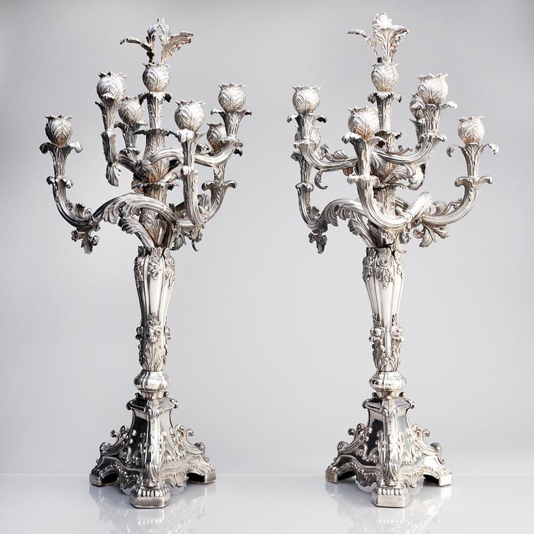 A pair of Swedish mid 19th century silver candelabra, marks of Gustaf Möllenborg, Stockholm 1844.