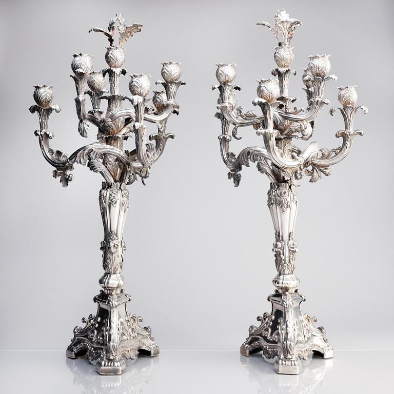 A pair of Swedish mid 19th century silver candelabra, marks of Gustaf Möllenborg, Stockholm 1844.