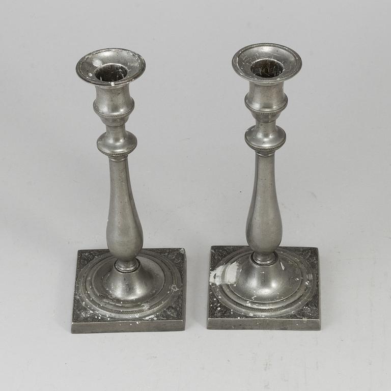 A pair of empire pewter candlesticks, first half of the 19th century.