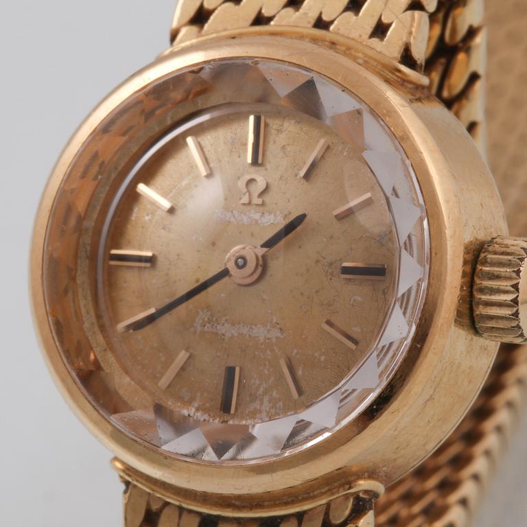 DAMARMBANDSUR, 18K guld, Omega. Vikt 44,6 gram.