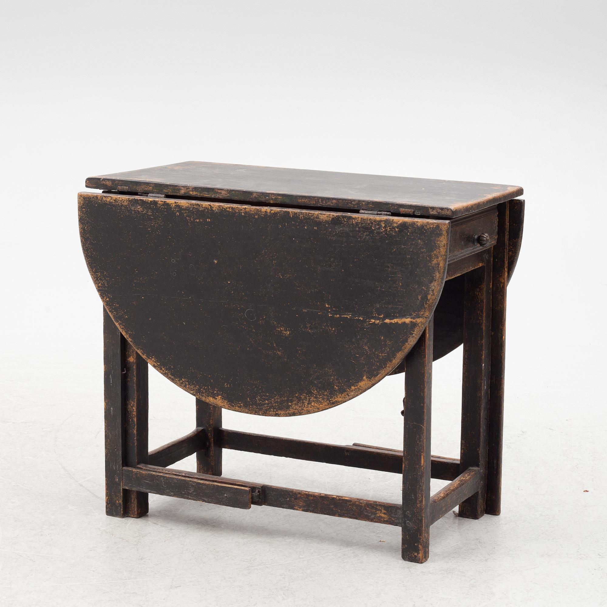 A Swedish wooden table, 19th century.