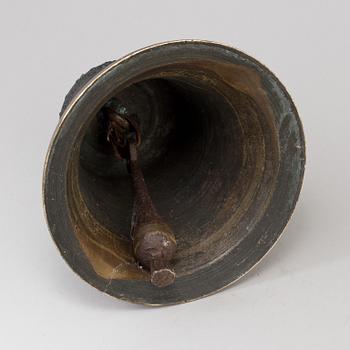 A BRONZE AND IRON BELL, dated 1759.