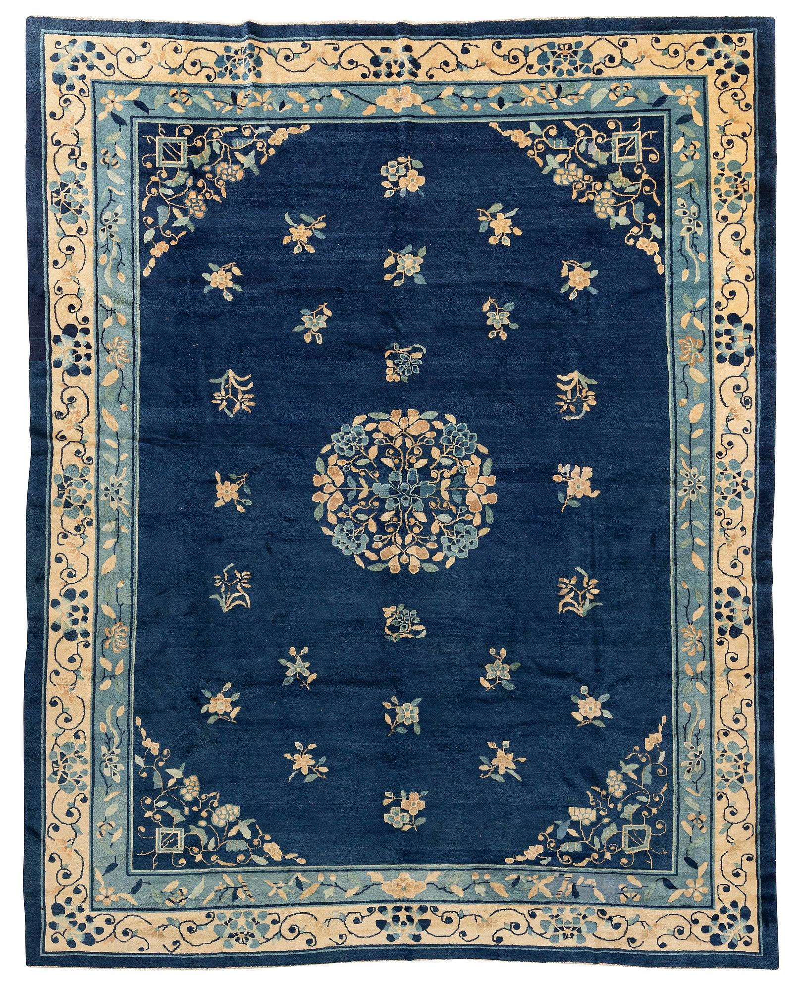 An antique Peking (Beijing) carpet, North China, c. 340 x 275 cm.