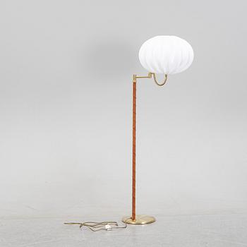 A brass floor light from EWÅ, second half of the 20th Century.