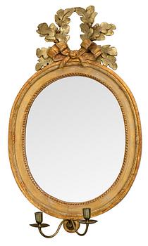 A Gustavian two-light girandole mirror by N. Meunier.