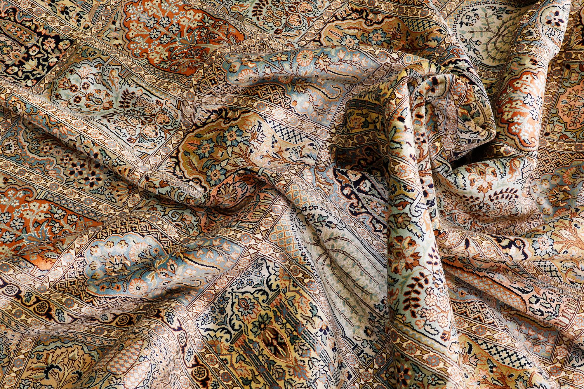 A carpet Silke Kashmir, sk 24X24, ca 372 x 272 cm.