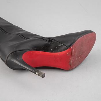 CHRISTIAN LOUBOUTIN, a pair of leather boots, size 37.