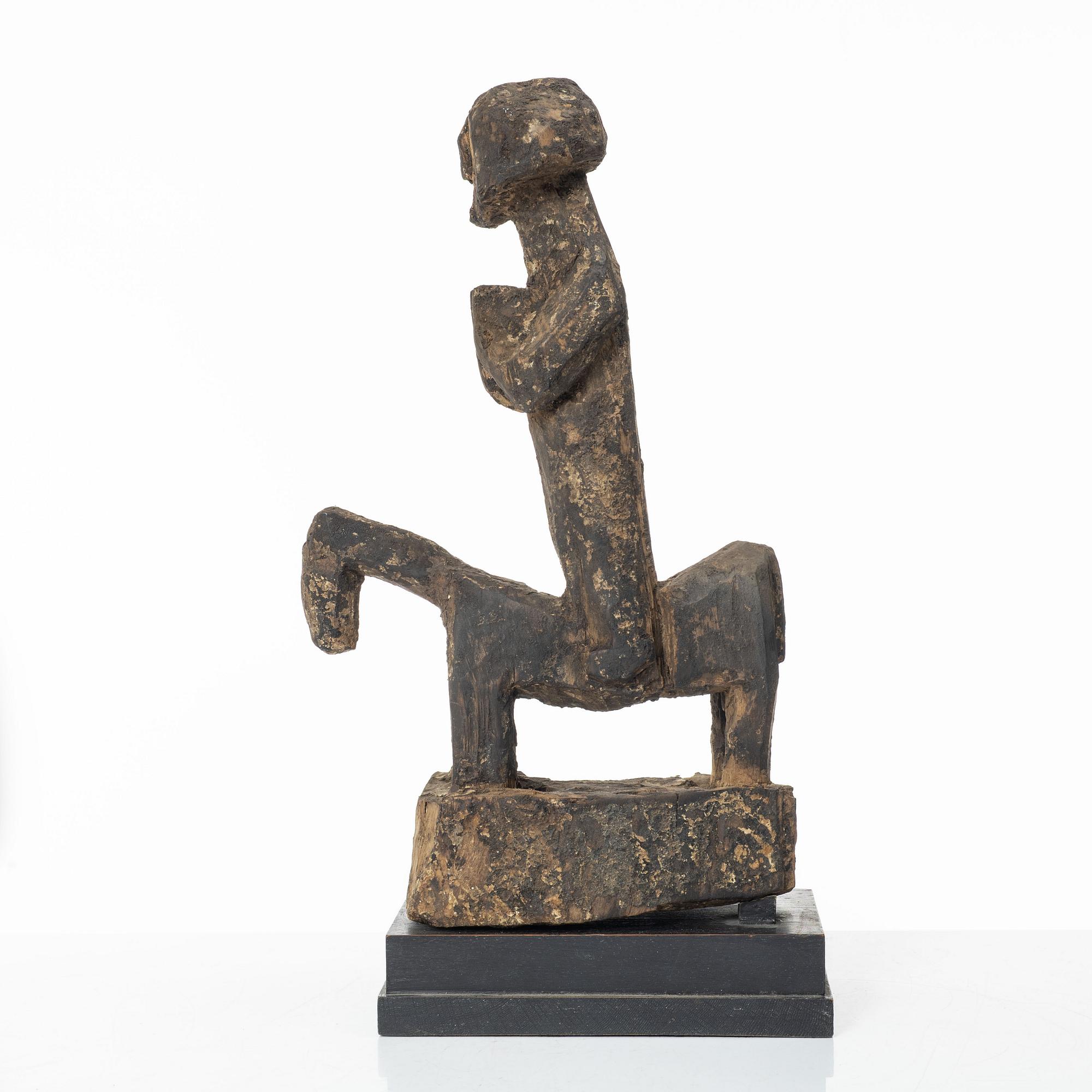 A horserider wooden sculpture, Western Nepal.