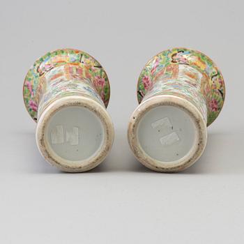 A pair of famille rose Canton porcelain vases, Qing dynasty, 19th century.