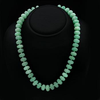 Necklace carved jade beads approx 15 mm and smaller glass beads , clasp metal, approx 50 cm.