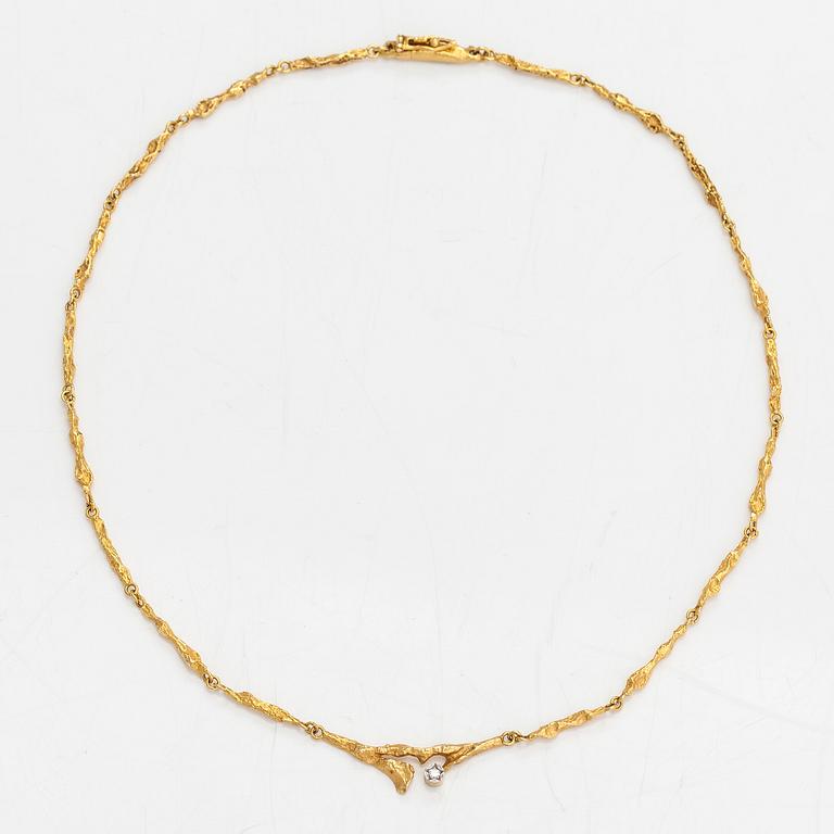 Björn Weckström, Halsband "Vårdagg", 18K guld och diamant ca 0.08 ct. Lapponia 1979.